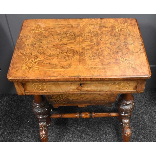 458 - A Victorian walnut marquetry inlaid workbox with slide box drawer, turned columns united by a single... 