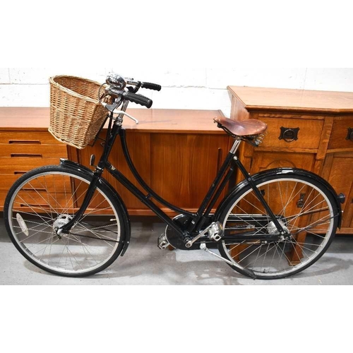 468 - A lady's Pashley bicycle with basket and bell.