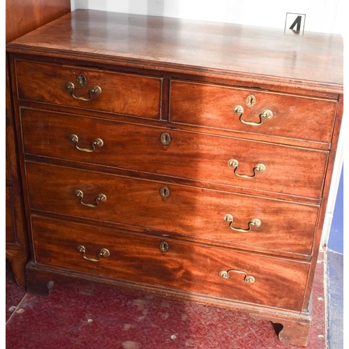 477 - A Georgian mahogany chest of drawers, the two short over three long graduated drawers having brass s... 