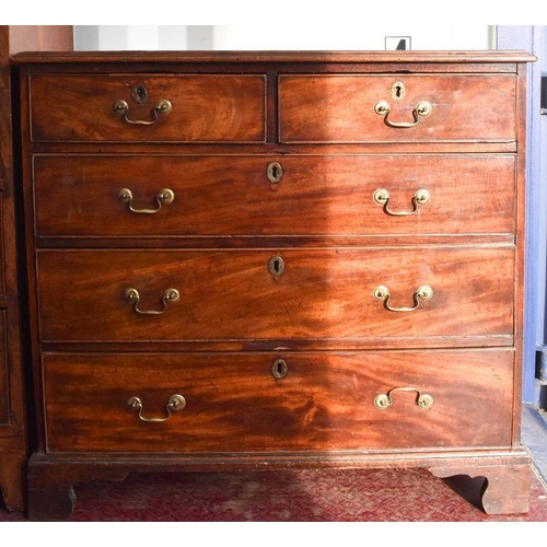 477 - A Georgian mahogany chest of drawers, the two short over three long graduated drawers having brass s... 