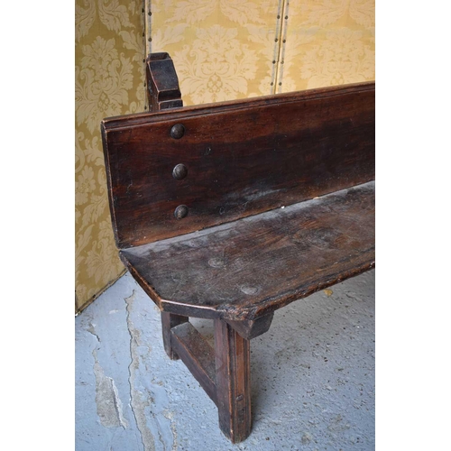 499 - A 17th century Spanish long bench, composed to two planks and three supports united with large iron ... 