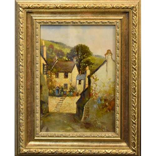 57 - A 20th century oil on board depicting Polperro Cornwall, oil on board, signed lower right J A Park, ... 