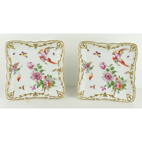 204 - A pair of late 19th century Chelsea plates of square form, depicting bird of paradise, flowers and i... 