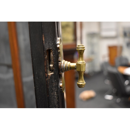 500 - An unusual and impressive mahogany and glass display cabinet, with triple domed top and curved ends,... 