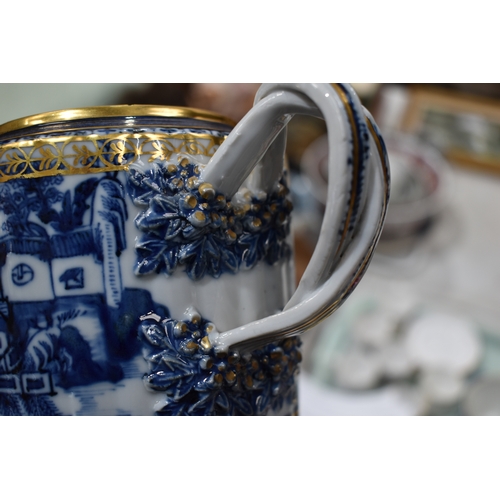 212a - A 19th century Chinese export blue and white teapot and cover, with gilded highlights, the cover wit... 