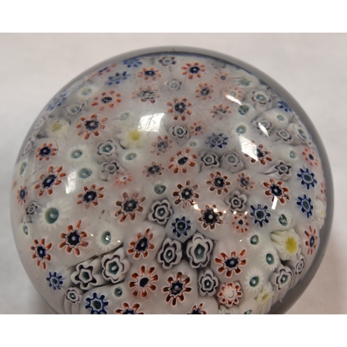 207 - A group of glass paperweights to include millefiori, tear drop and other examples.