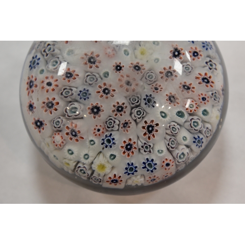 207 - A group of glass paperweights to include millefiori, tear drop and other examples.