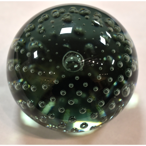 207 - A group of glass paperweights to include millefiori, tear drop and other examples.