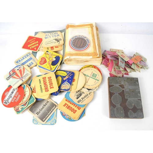 108 - A group of vintage beer mats, 1960s and later, to include World Cup 1966, Babycham, White Horse, Bab... 