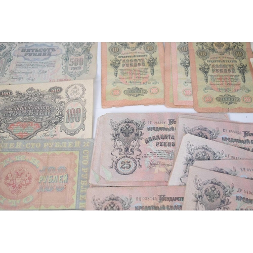 141 - A large group of late 19th and early 20th century bank notes, mostly pre-revolution Russian Rubles, ... 