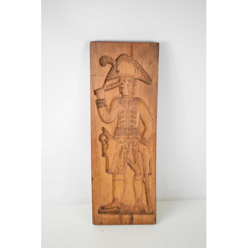 146 - A group of collectables comprising a wooden shortbread mould carved with a woman in Elizabethan dres... 