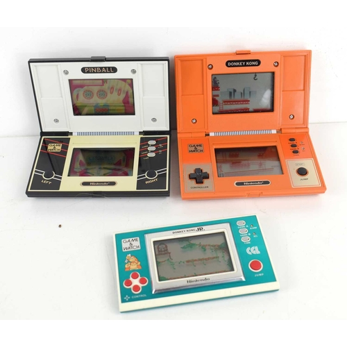 17 - A group of three Nintendo hand held Game and Watch consoles, comprising Donkey Kong Multiscreen, Don... 