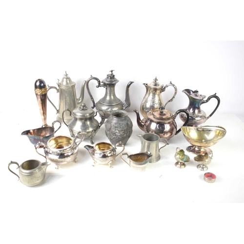 175 - A quantity of pewter and silver plate to include tea and coffee pots, sauce boat and other items.