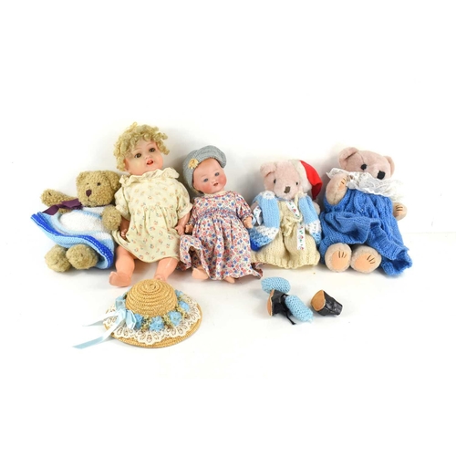 19 - Two vintage Armand Marseilles dolls, both with sleeping eyes, together with two later 20th century t... 