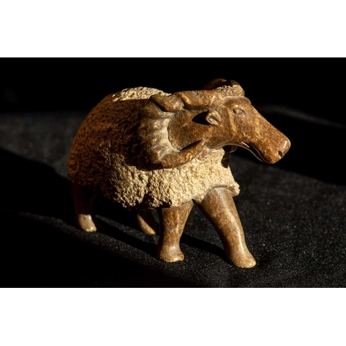 206 - A contemporary stone sculpture of an American Bighorn Sheep in the round with smoothly carved limbs ... 