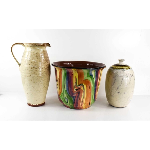 207 - The Royal Torquay Potteries jardiniere in multicolours, a jug by Tessa Buckley, and a further vase s... 