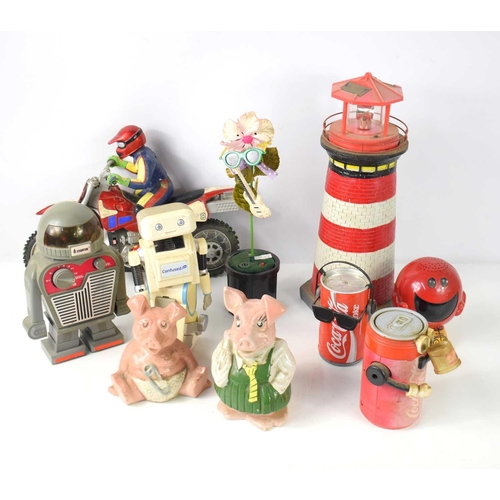 30 - A group of vintage toys to include novelty Cola Cola musical cans, Wade Natwest piggy banks, Steeple... 