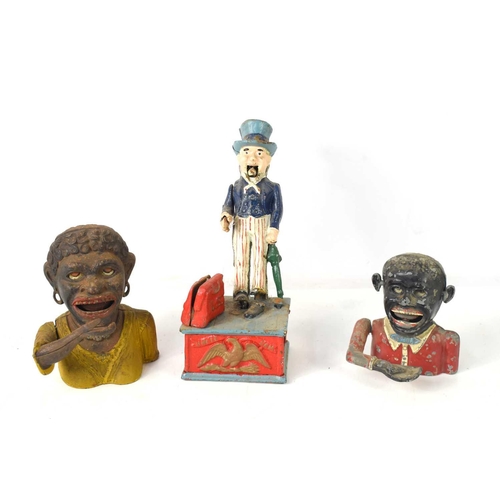 36 - Three vintage cast money banks to include Uncle Sam. a/f