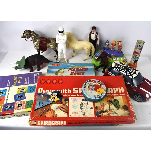 A group of vintage toys and board games to include Merit Magnetic Fishing  Game, Spirograph, action f