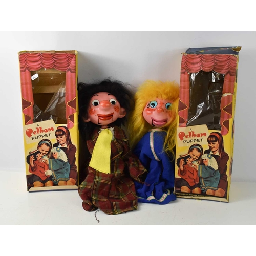 43 - Two vintage Pelham Ventriloquial puppets, comprising a man with plaid shirt and a woman with blonde ... 