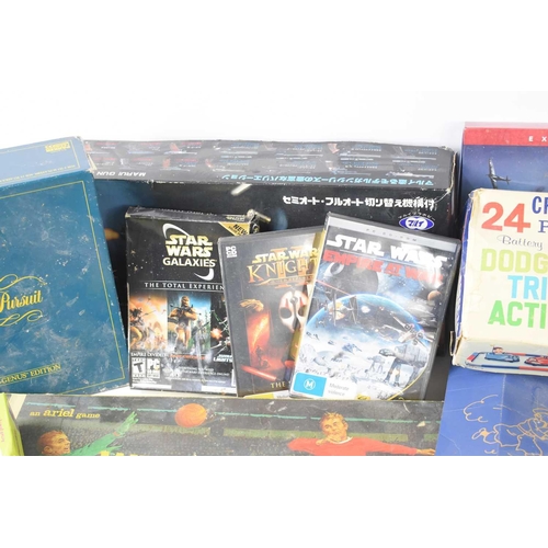 53 - A group of toys, some vintage to include a boxed Tintin finger puppets and theatre, Star Wars PC gam... 