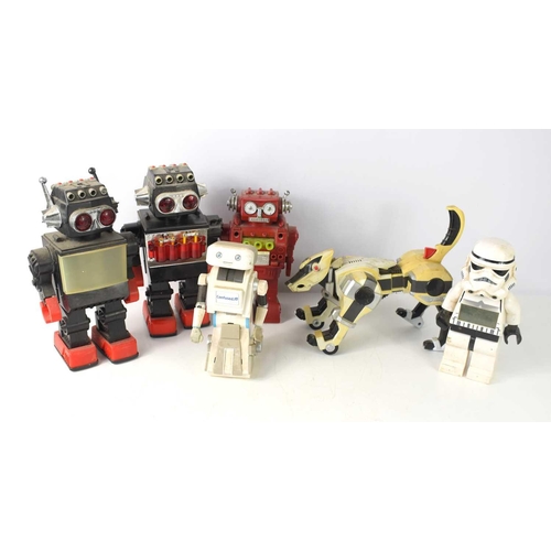 57 - A collection of vintage battery operated toy robots together with a battery operated Lego 