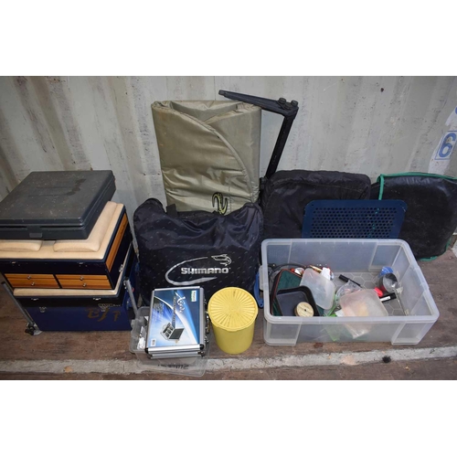 A group of fishing tackle to include a fishing tackle box with