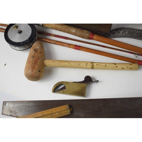 597 - A group of tools, including an Irish scythe, a Shillelagh, vintage saw, files, brass plane, hammer a... 