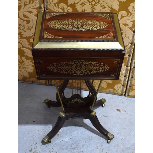 646 - A Regency rosewood and brass inlaid teapoy on stand, the sarcophagus shaped teapoy with brass beadin... 