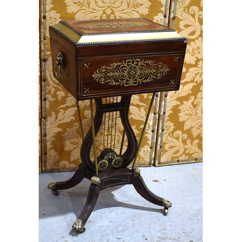 646 - A Regency rosewood and brass inlaid teapoy on stand, the sarcophagus shaped teapoy with brass beadin... 