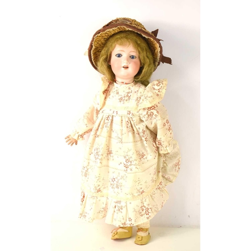 65 - A vintage Armand Marseilles doll, numbered 390 and A-61/2-M to the back of the head, with porcelain ... 