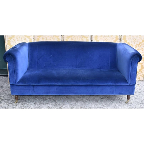 652 - A pair of country house style three seater sofas with scroll arms, upholstered in navy blue draylon ... 