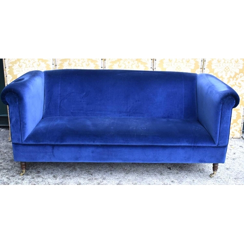 652 - A pair of country house style three seater sofas with scroll arms, upholstered in navy blue draylon ... 