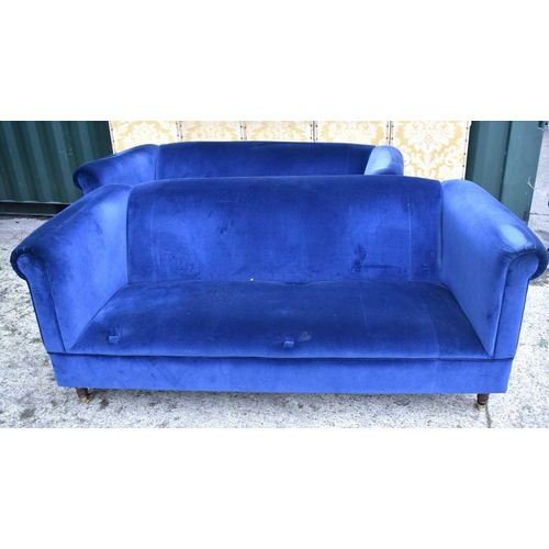 652 - A pair of country house style three seater sofas with scroll arms, upholstered in navy blue draylon ... 