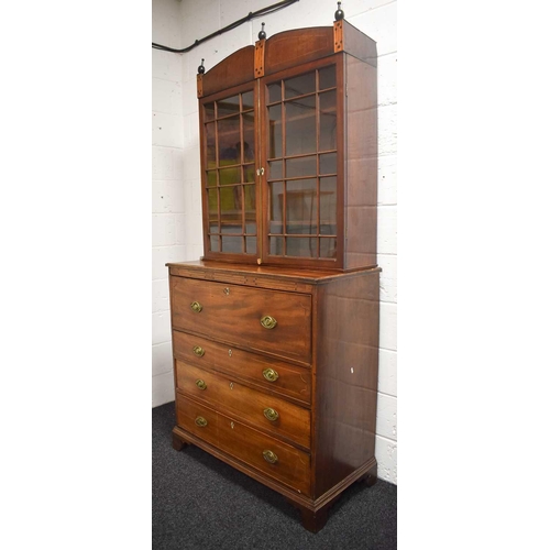 657 - A 19th century mahogany secretaire bookcase, the glazed upper section having inlaid ebonised roundel... 