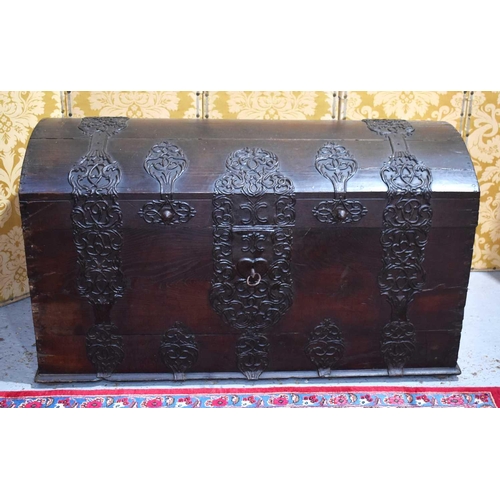 665 - An 18th century Dutch marriage chest of large proportions, with decorative iron strapwork throughout... 