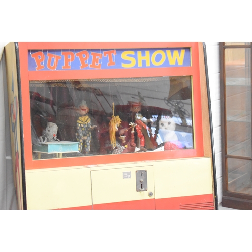 86a - A vintage coin operated amusement arcade Puppet show, 165cms tall by 61cms deep by 107cms wide