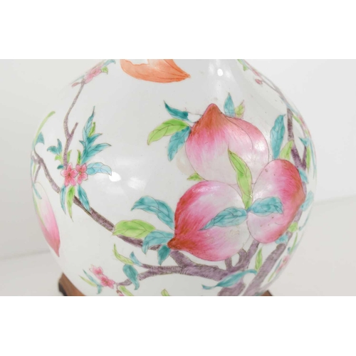 306 - A 19th century Chinese bottle form vase, depicting peaches and bats, 34cm high.