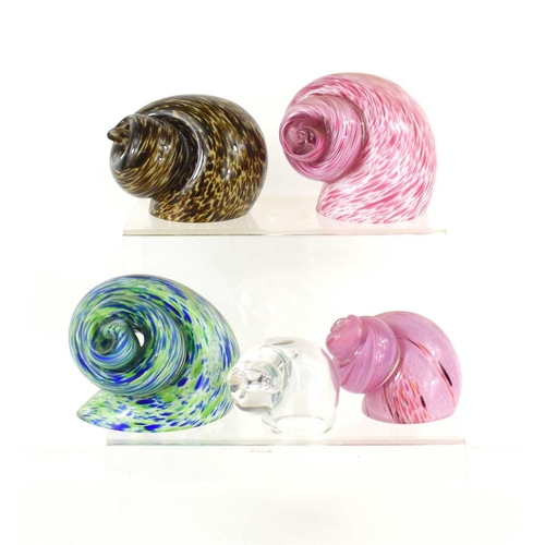 57 - A group of five early Wedgwood, Kings Lynn glass snail shell paperweights, designed by Ronald Stenne... 