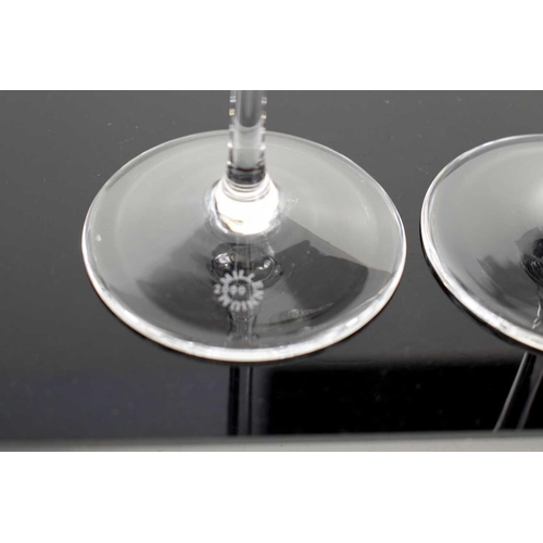 96 - A pair of crystal Millennium champagne flutes, with long tapered stems, 33cm high.