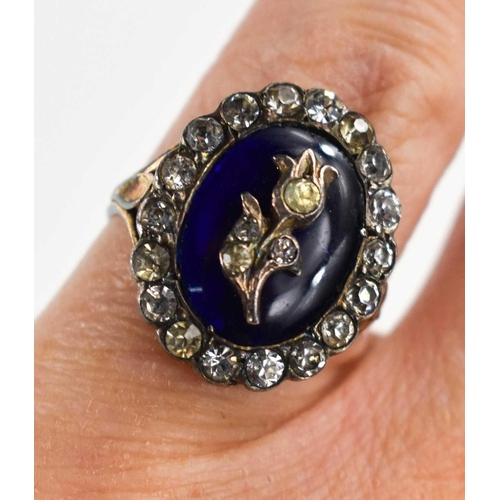 1 - A Georgian paste and enamel mourning ring, of oval form, unmarked but testing as at least 14ct gold,... 