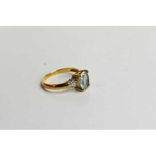106 - A 9ct gold, aquamarine and diamond ring, the oval aquamarine of approximately 8.8 by 6.8mm with diam... 