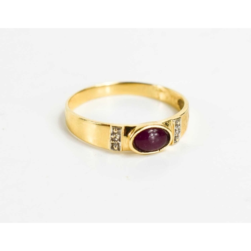 115 - A 14ct gold, cabochon ruby and diamond set ring, central oval ruby, with a diamond brilliant to each... 