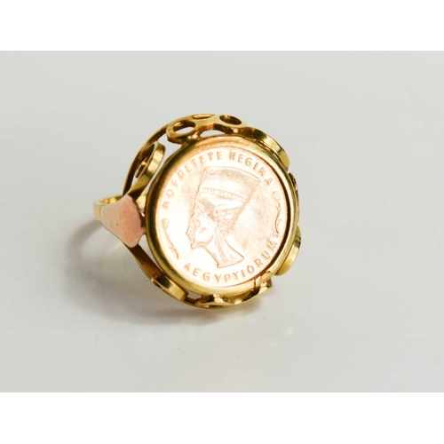 129 - A Nefertiti Regina coin set in 14ct gold ring mount, size M/N, 3.7g total weight.