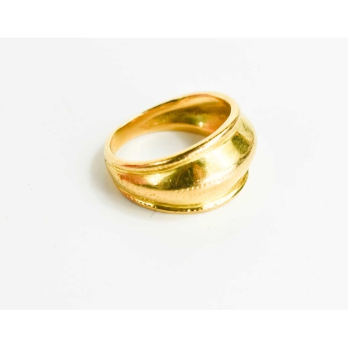 14 - An 18ct gold ring, in the ancient Norwegian style, size M, 8.36g.