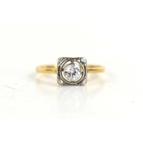 147 - An Art Deco 18ct gold and diamond ring, in a square design, size O 1/2, 2.2g. 