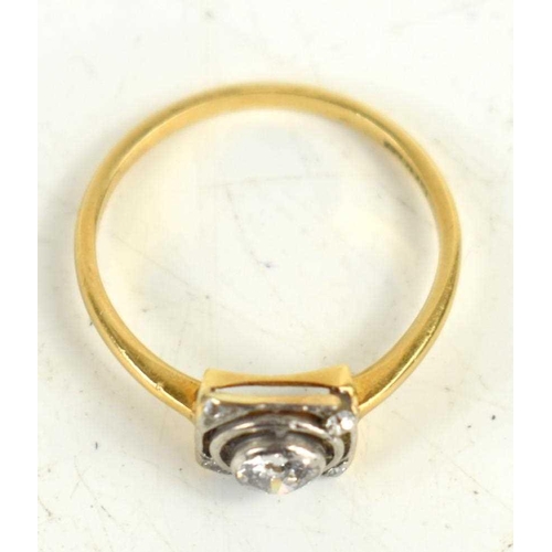 147 - An Art Deco 18ct gold and diamond ring, in a square design, size O 1/2, 2.2g. 