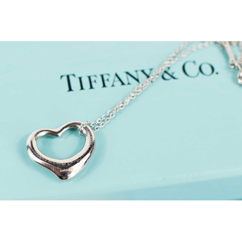 17 - An Elsa Peretti for Tiffany & Co platinum heart pendant and chain, 5.5g, with the original leather p... 