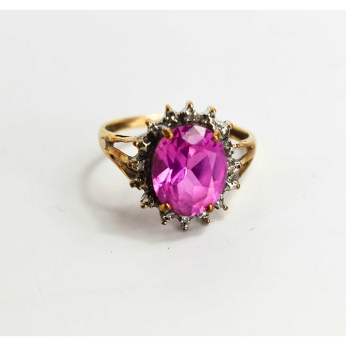170 - A 9ct gold, pink sapphire and diamond ring, size L½, 2.38g.