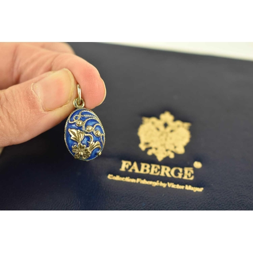 172 - A Faberge enamel and silver egg form pendant, from the Victor Mayer collection, in the original box.